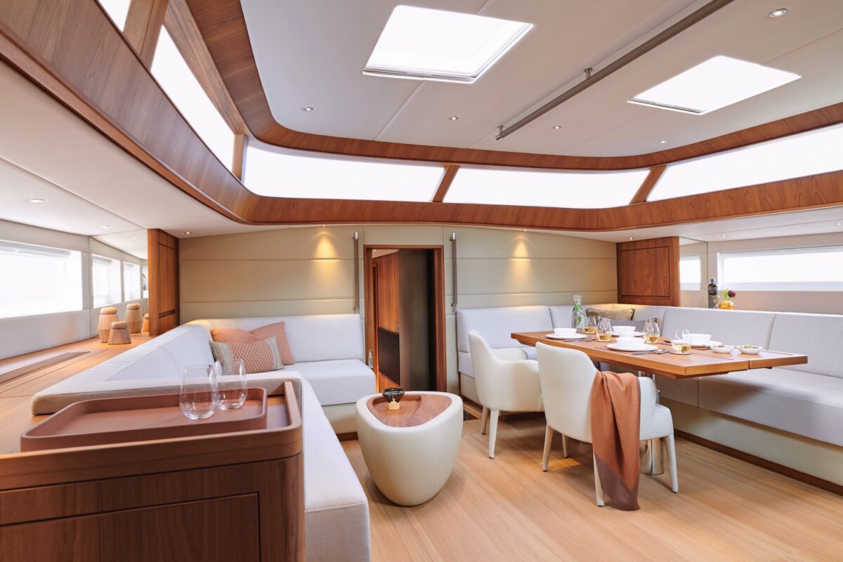 Light airy sailing yacht saloon with light coloured furniture 
